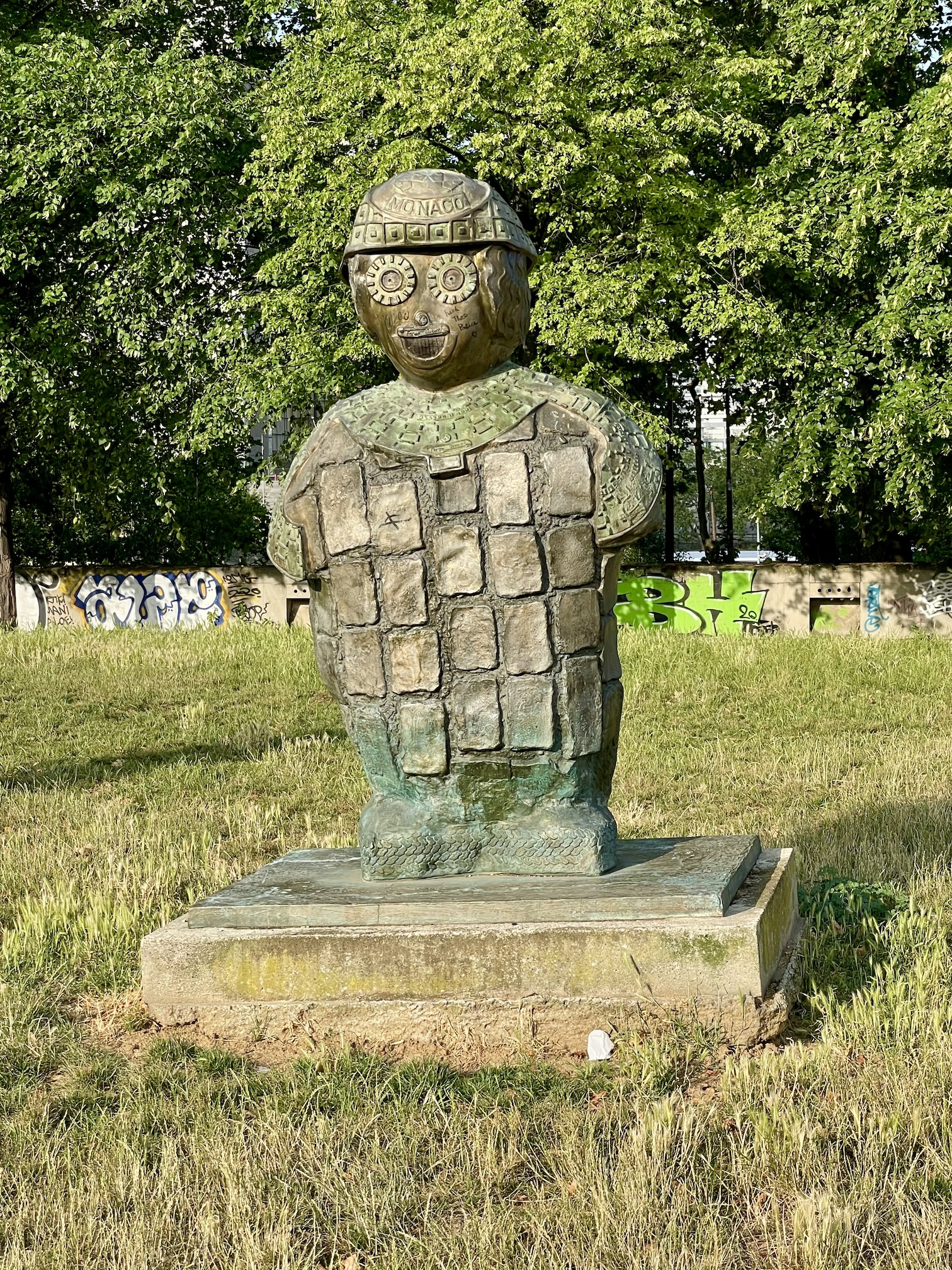 The cap has 'Monaco' inscribed in it. Couldn't determine if the others had similar.