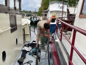 Refreshing the black trim made easier by straddling and the rubbing strake.