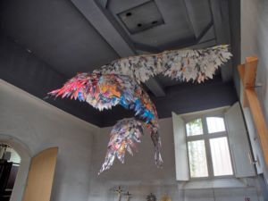 A rather uninspiring art museum/gallery - a paper bird.
