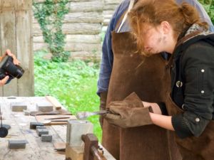 Pouring the molten pewter into the mould