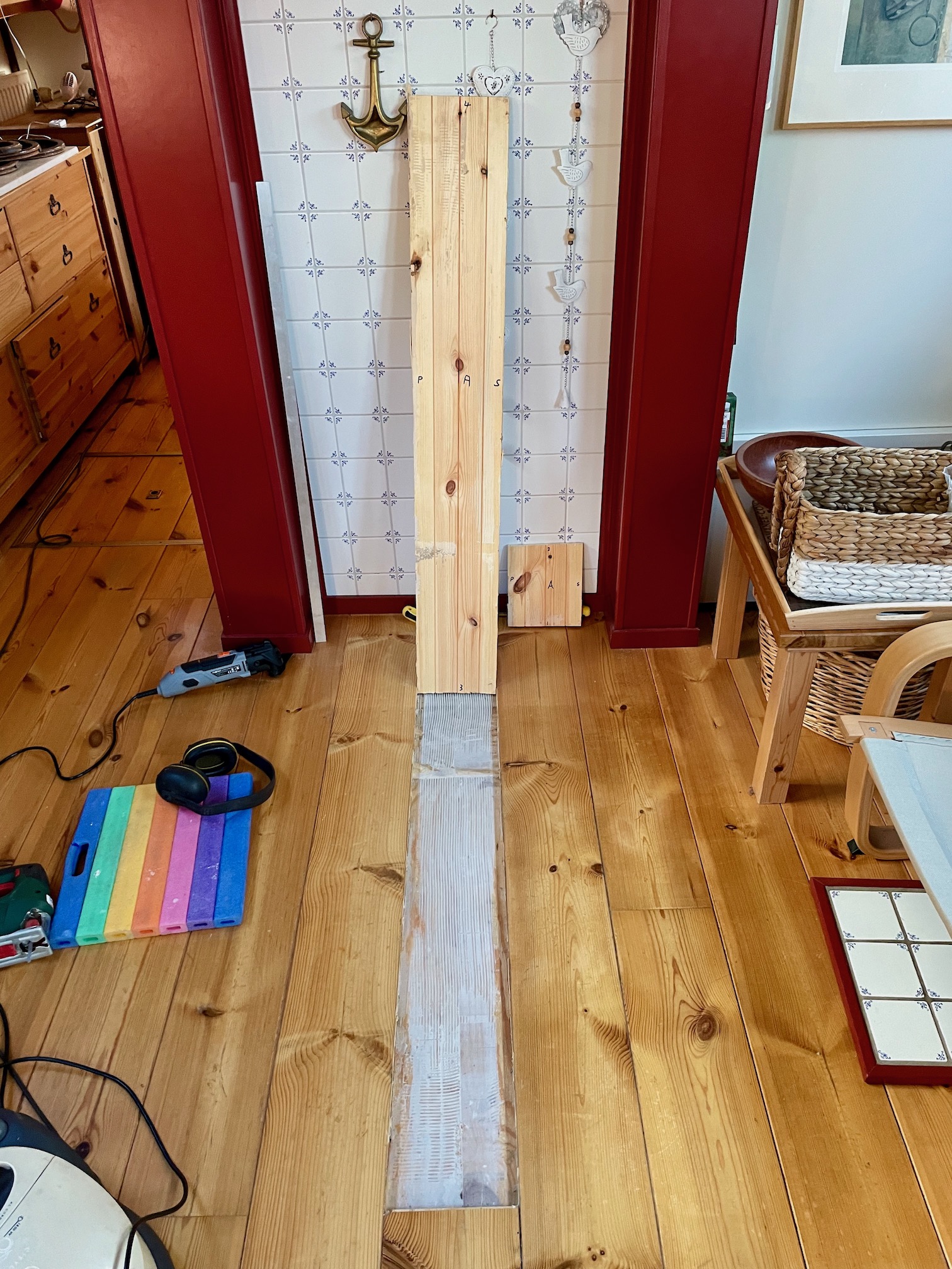 The first section of flooring is up.