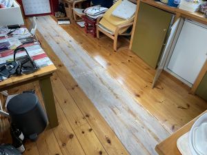 The sub-flooring revealed.