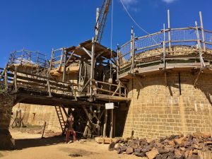 Lifting a stone to be added to the battlements