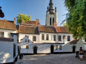 The courtyard buildings with the St Maartenskirk behind.